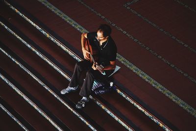 Full length of man on steps