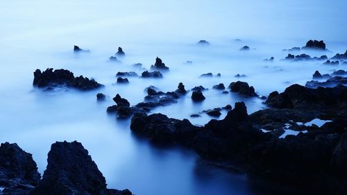 Panoramic view of rocks against sky