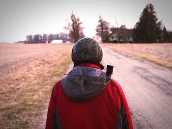 Rear view of man on snowy field