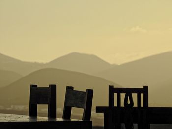 Scenic view of mountains against sky during sunset