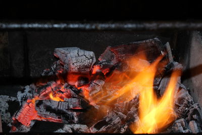 Close-up of fire on barbecue grill