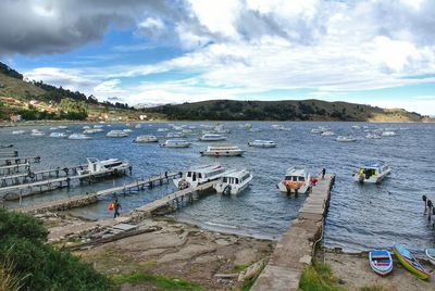 High angle view of boats moored at harbor