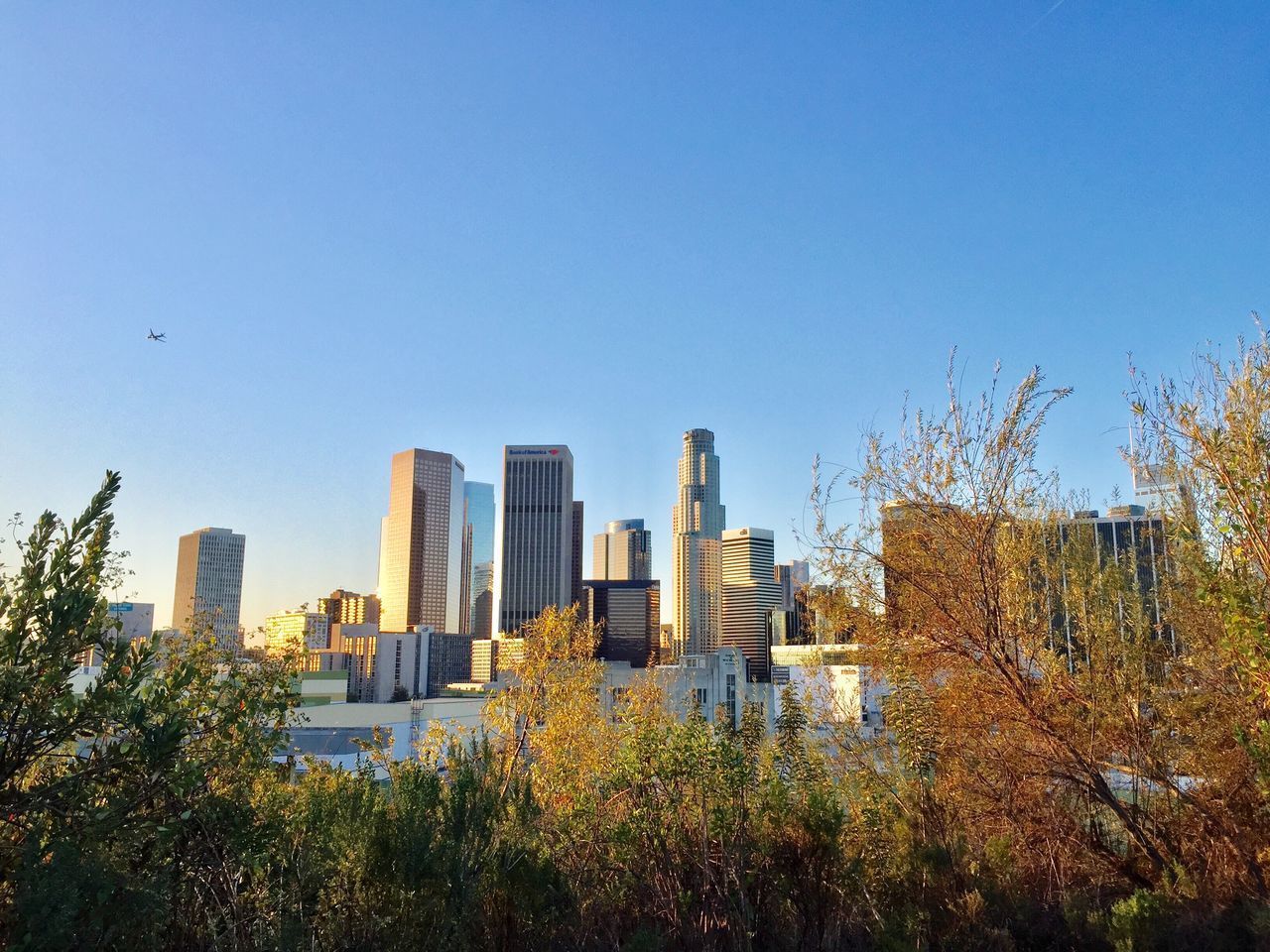 MODERN CITYSCAPE AGAINST SKY