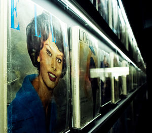 Portrait of man looking through window