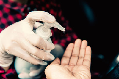 Close-up of woman holding hands