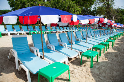 Row of chairs on beach