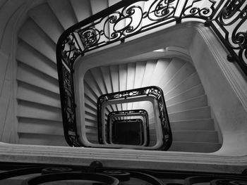 Directly below shot of spiral staircase in building