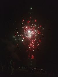 Firework display at night