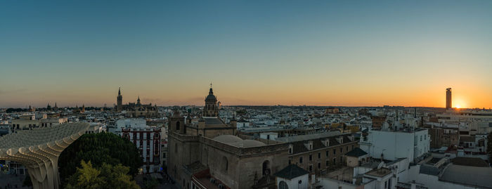 High angle view of city at sunset