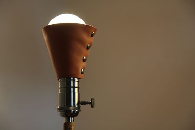 Close-up of lamp against black background