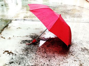 Close-up of wet red umbrella
