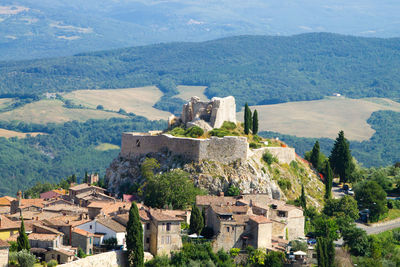 High angle view of townscape against mountains