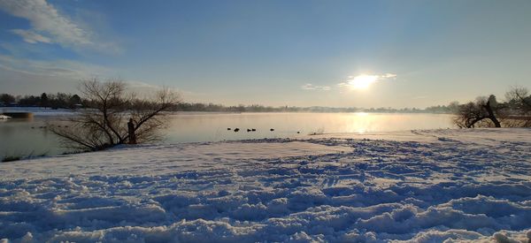 Beautiful sunrise over a snowy lake