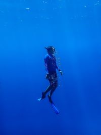 Side view of a snorkeling underwater