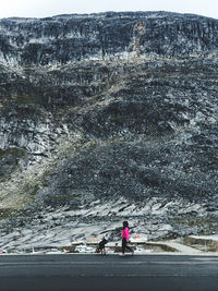 Women walking on mountain road