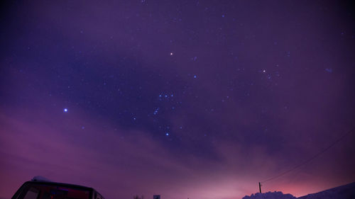 Low angle view of stars in sky at night