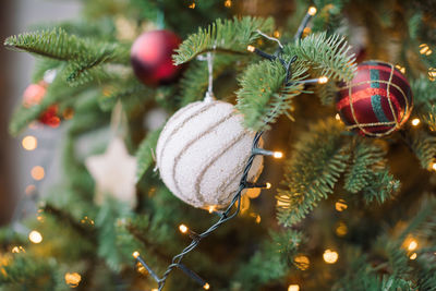 Close-up of christmas decoration hanging on tree