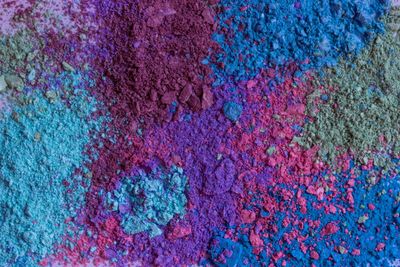 Colorful broken eye shadow, crushed pigment. 