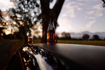 Glass of bottle on table