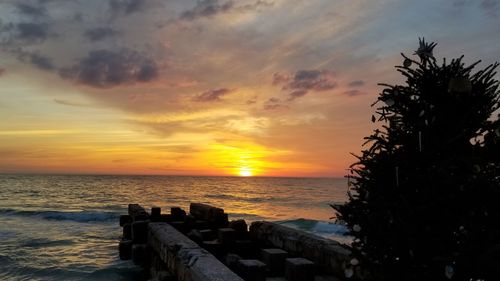 Scenic view of sea against sky during sunset