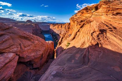 Panoramic view of rock formations against sky