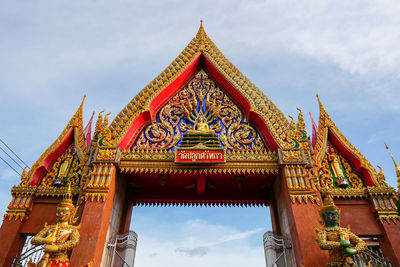 Low angle view of temple against building