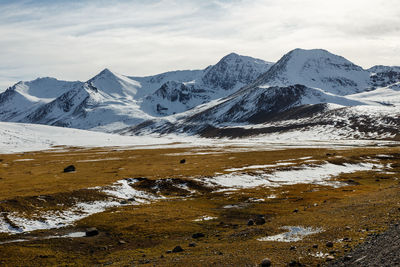 Snowy mountain peaks on the ala bel pass, bishke-osh highway