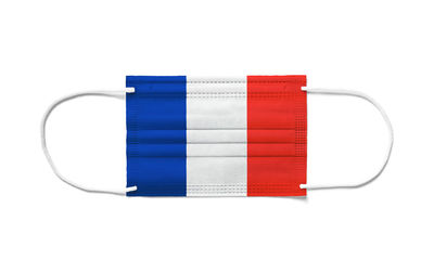 Close-up of red mailbox against white background