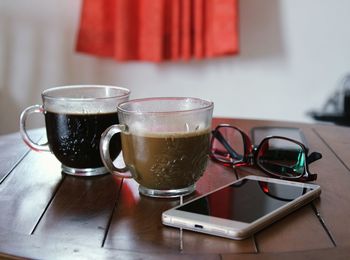 Close-up of coffee cup on table