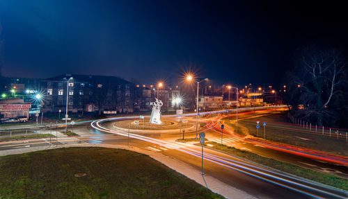 Light trails on city street at night