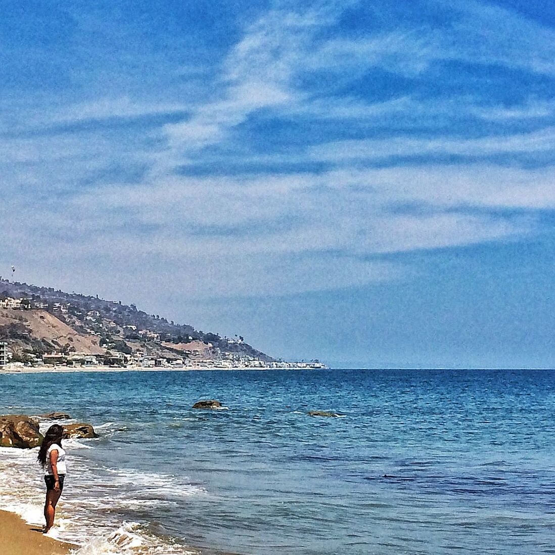 sea, water, lifestyles, leisure activity, blue, sky, beach, men, vacations, scenics, horizon over water, beauty in nature, shore, person, tranquility, nature, tranquil scene, enjoyment