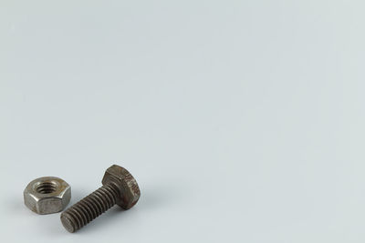 High angle view of electric lamp on table against white background