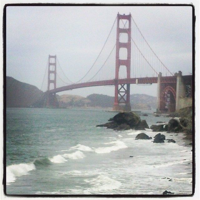 water, connection, bridge - man made structure, suspension bridge, built structure, sea, architecture, engineering, golden gate bridge, bridge, travel destinations, sky, river, clear sky, transfer print, transportation, international landmark, famous place, auto post production filter, waterfront