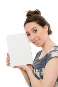 Portrait of a smiling young woman over white background