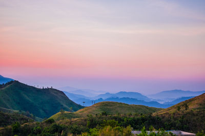 Scenic view of mountains against sky during sunset