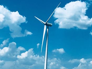 Low angle view of wind turbine against sky