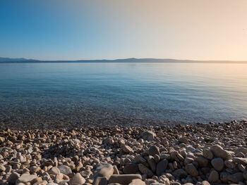 Scenic view of sea against clear sky