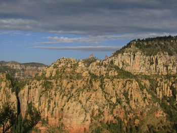 Scenic view of rocky mountains against sky