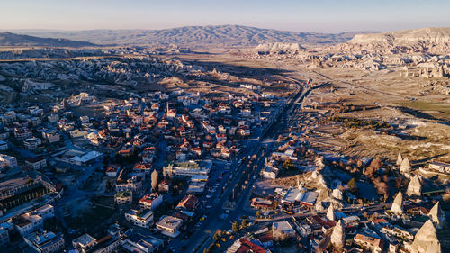 Aerial view of cityscape against sky