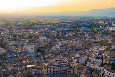 High angle view of townscape against sky during sunset