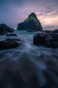 Scenic view of sea against sky at sunset