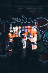 Rear view of man photographing woman with camera