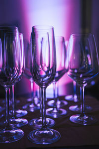 Close-up of wine glasses on table