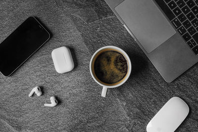 High angle view of coffee cup on table