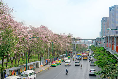 Cars on road against sky