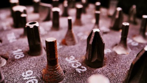 High angle view of chess pieces on table