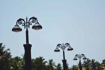 Low angle view of street light against clear sky