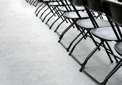 High angle view of empty chairs and tables