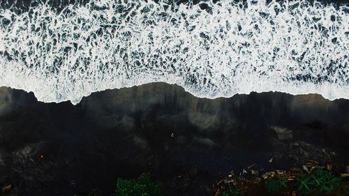 Close-up of silhouette mountain against sky