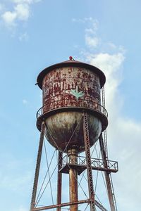 Low angle view of water tower against sky